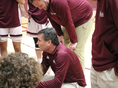 Coach Shepherd with the team